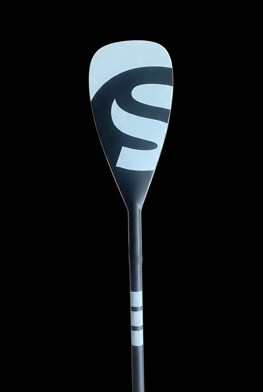 SUPMOJO carbon paddle blade with S graphic on a black background